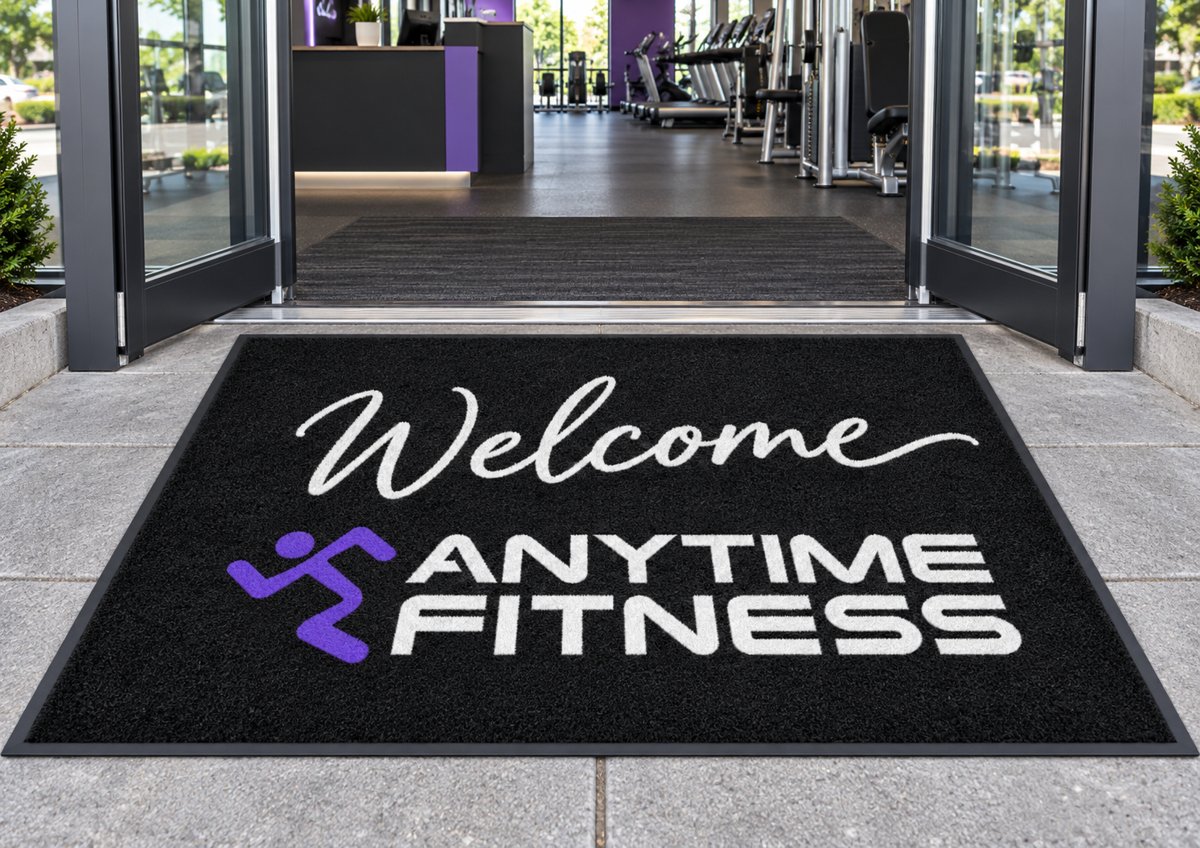 Welcome Anytime Fitness custom logo mat at a gym entrance