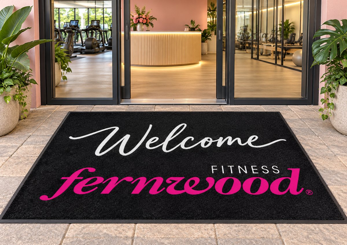 Welcome Fernwood Fitness custom logo mat at a club entrance