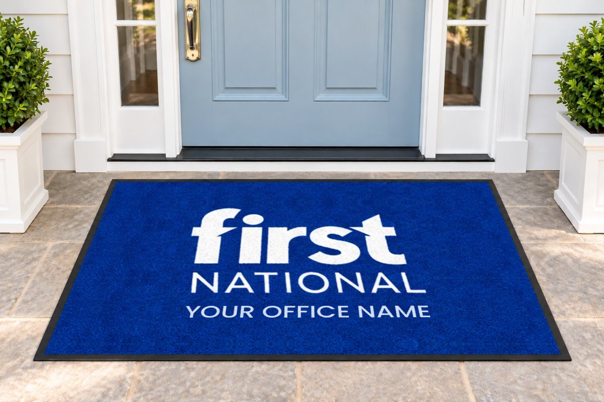 Royal blue mat with a large First National logo and office name