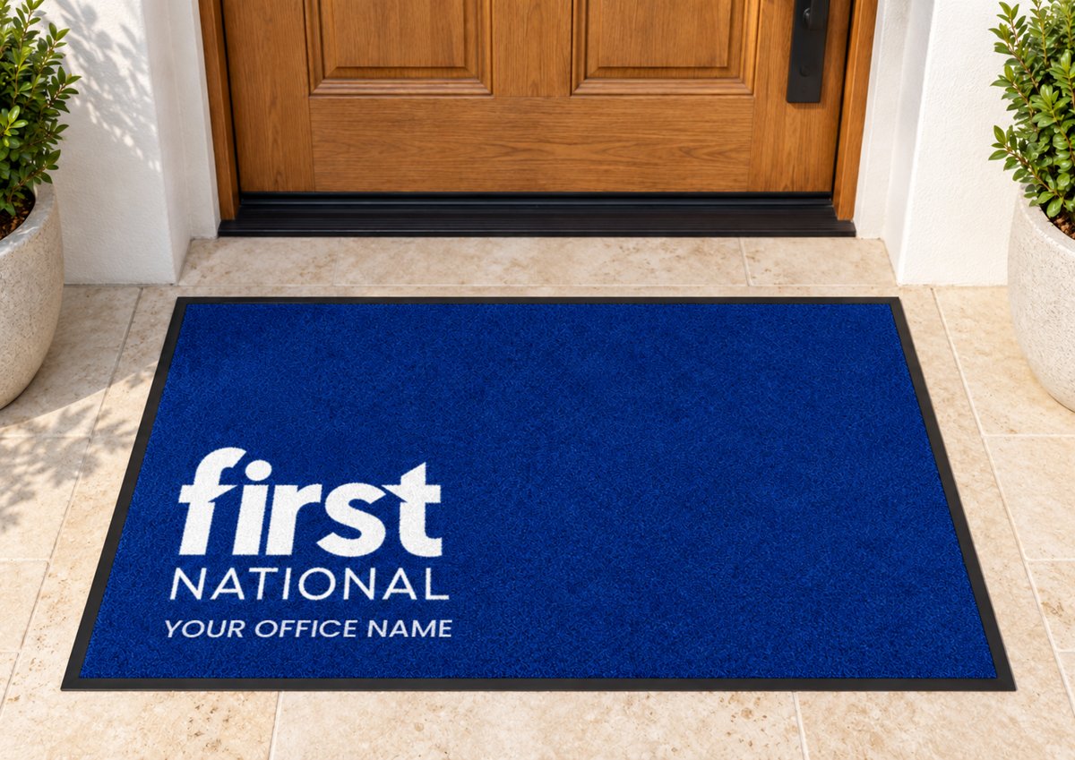 Royal blue mat with the First National logo in the corner