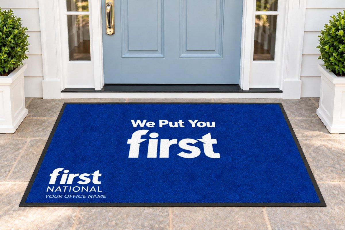 Royal blue mat reading We Put You first with the First National logo