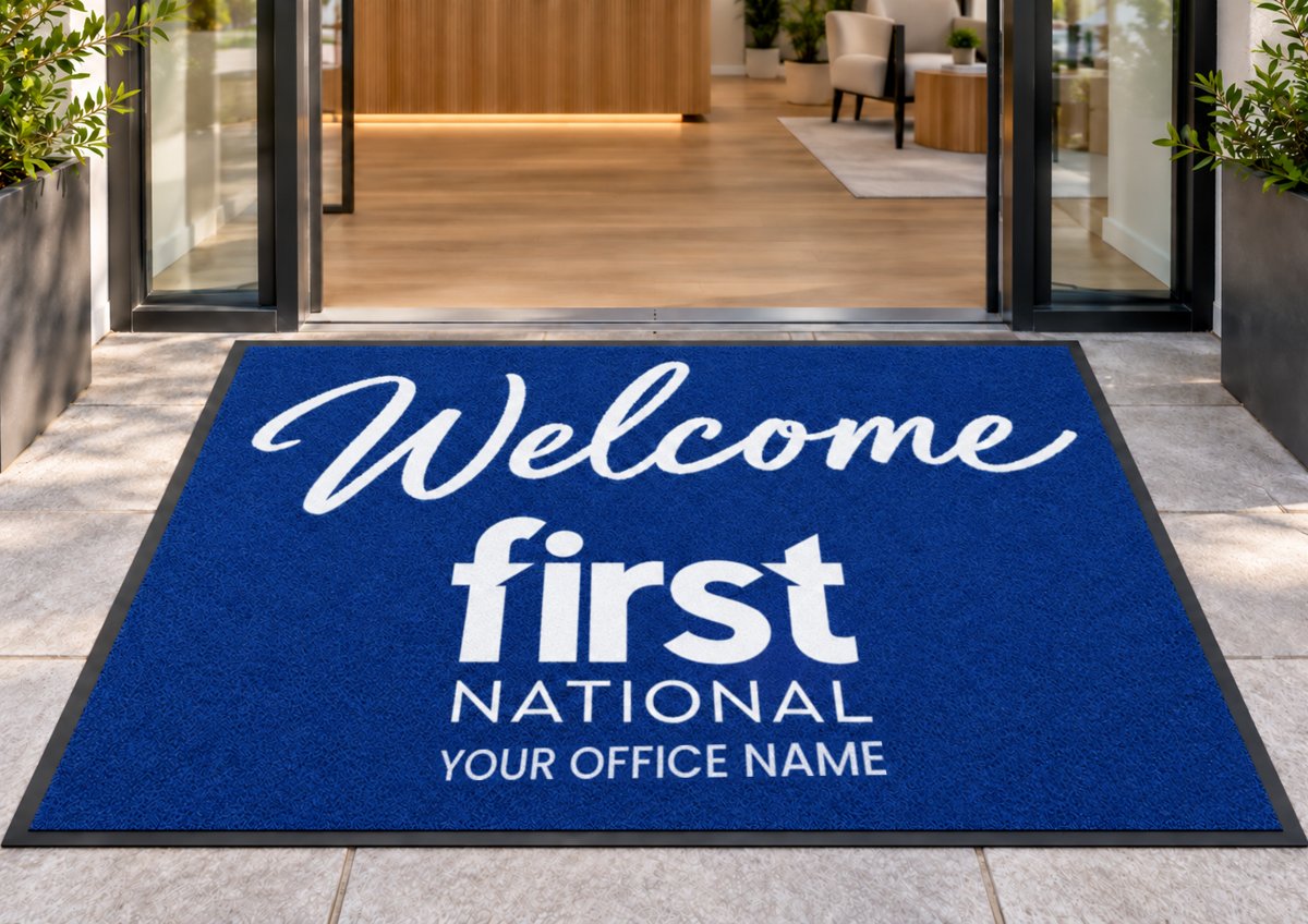 Welcome First National logo mat at an office entrance