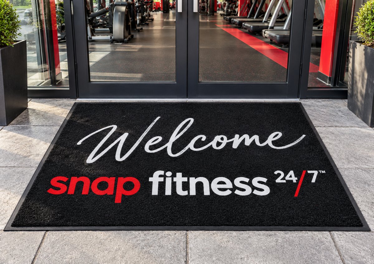 Welcome Snap Fitness custom logo mat at a gym entrance